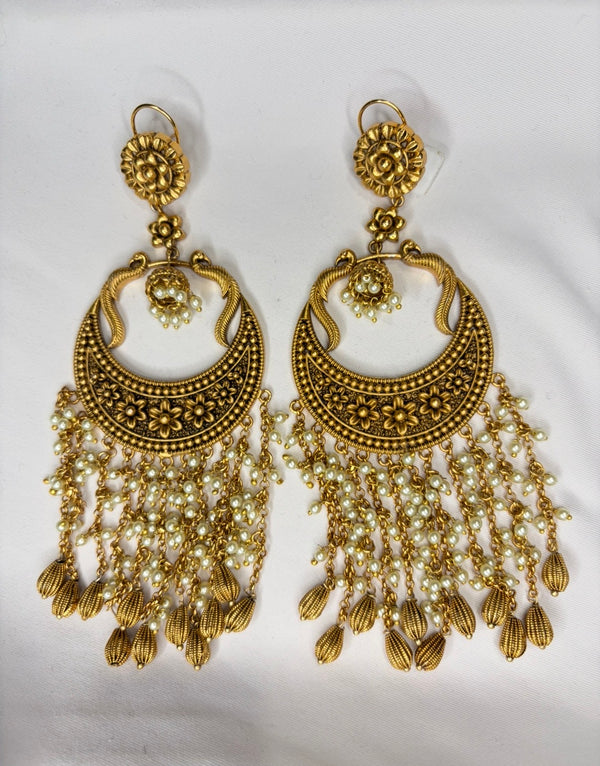Gold statement earrings